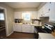 Bright kitchen features essential appliances, ample counter space, and a functional layout at 1910 Trexler Ct, Raleigh, NC 27606