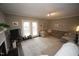 Large living room provides tons of space for furniture, as well as neutral flooring at 1910 Trexler Ct, Raleigh, NC 27606