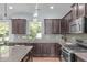 Beautiful kitchen featuring granite countertops, stainless appliances, and eat in breakfast bar at 1939 Mostyn Ln, Apex, NC 27502