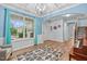 Spacious living area with large windows, hardwood floors, and elegant decor at 1939 Mostyn Ln, Apex, NC 27502