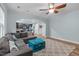 Open-concept living room seamlessly connects to the kitchen and dining areas at 1939 Mostyn Ln, Apex, NC 27502