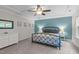 Inviting main bedroom with a tray ceiling, neutral walls, and carpet floors at 1939 Mostyn Ln, Apex, NC 27502