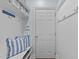 Functional mudroom with bench seating, hooks, and storage for organization at 1939 Mostyn Ln, Apex, NC 27502