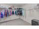 Spacious walk-in closet with ample shelving and plenty of room for storage at 1939 Mostyn Ln, Apex, NC 27502