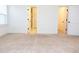 Spacious bathroom featuring gray vanity and tiled floors, with a door to the walk-in closet at 1950 Menet St, Apex, NC 27502