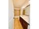 Bathroom features a double vanity, shower, and tile flooring at 1950 Menet St, Apex, NC 27502