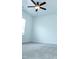 A bright bedroom with neutral carpet, white walls, and plenty of natural light at 1950 Menet St, Apex, NC 27502