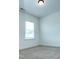 Bedroom with neutral carpet, white walls, and a window allowing natural light at 1950 Menet St, Apex, NC 27502