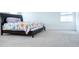 This bedroom features carpet, one window and a floral bed at 1950 Menet St, Apex, NC 27502