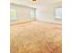 Large bedroom featuring neutral walls, carpet, and natural light from the windows at 1950 Menet St, Apex, NC 27502