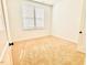 Cozy bedroom with a neutral carpet and a window providing natural light at 1950 Menet St, Apex, NC 27502