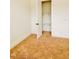 Bedroom with neutral carpet and closet with adjustable shelving at 1950 Menet St, Apex, NC 27502