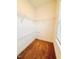 Functional walk-in closet provides shelving and space for organizing clothes and personal items at 1950 Menet St, Apex, NC 27502