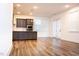 Bright, open kitchen featuring stainless steel appliances and modern finishes at 1950 Menet St, Apex, NC 27502
