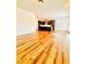 Bright, open living space featuring hardwood floors and kitchen at 1950 Menet St, Apex, NC 27502