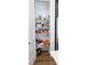 Walk-in pantry with wire shelving provides ample storage space for groceries at 1950 Menet St, Apex, NC 27502