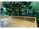 Spacious wooden deck with outdoor seating, ideal for relaxation and entertaining guests outdoors at 2004 Flagstone Pl, Raleigh, NC 27612