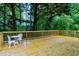 Wide back deck with outdoor table and chairs, perfect for entertaining and enjoying the outdoors at 2004 Flagstone Pl, Raleigh, NC 27612