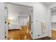 View of a bedroom featuring hardwood floors, a ceiling fan, and neutral walls at 2004 Flagstone Pl, Raleigh, NC 27612