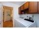 Well-equipped laundry area with updated appliances and convenient access to the kitchen at 2004 Flagstone Pl, Raleigh, NC 27612