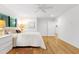 Inviting main bedroom with hardwood floors and natural lighting at 2004 Flagstone Pl, Raleigh, NC 27612