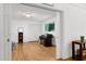 Inviting home office with natural light, hardwood flooring, and ample space for work and play at 2004 Flagstone Pl, Raleigh, NC 27612