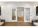 Bright sunroom with access to the bedroom through french doors at 2004 Flagstone Pl, Raleigh, NC 27612