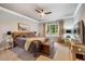 Cozy bedroom with neutral palette, carpet floors, and natural light at 201 Margaret Mann Way, Pittsboro, NC 27312