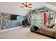 Angled-ceiling bedroom with a California Republic flag, a desk, and gray carpeting at 201 Margaret Mann Way, Pittsboro, NC 27312