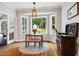 Cozy breakfast nook with bay windows overlooking the backyard garden at 201 Margaret Mann Way, Pittsboro, NC 27312