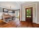 Dining area with hardwood floors, neutral walls, and ample natural light at 201 Margaret Mann Way, Pittsboro, NC 27312