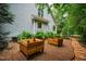 Landscaped yard with flower beds and mulched walking path leads to this light blue home at 201 Margaret Mann Way, Pittsboro, NC 27312