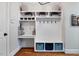 Mudroom features custom shelving, coat hooks, seating, and storage cubbies at 201 Margaret Mann Way, Pittsboro, NC 27312