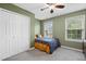 Bedroom with natural light and spacious closet at 202 Stonecreek Dr, Apex, NC 27539
