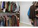 Walk in closet with plentiful storage space for clothing and accessories at 202 Stonecreek Dr, Apex, NC 27539