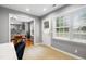 A versatile flex space with views into the kitchen and access to the backyard at 202 Stonecreek Dr, Apex, NC 27539