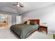 Spacious main bedroom boasts a ceiling fan and ensuite bathroom access at 202 Stonecreek Dr, Apex, NC 27539