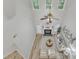 Bright living room with fireplace, high ceilings, and modern furnishings at 220 Misty Groves Cir, Morrisville, NC 27560