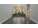 Elegant interior with tiled floors and archways, showcasing a planter with fountain and an open floor plan at 2208 Wimberly Woods Dr, Sanford, NC 27330