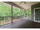 Covered porch featuring a ceiling fan and large opening to the back yard at 2208 Wimberly Woods Dr, Sanford, NC 27330