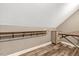 Unfinished attic space offers plenty of room for storage with built-in shelving and a workbench at 2258 Sanders Rd, Stem, NC 27581