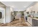 Bright kitchen seamlessly flows into the living area, complete with stainless steel appliances and lots of cabinet space at 2258 Sanders Rd, Stem, NC 27581