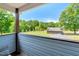 Scenic view from the outdoor patio overlooking a well-maintained lawn at 2258 Sanders Rd, Stem, NC 27581