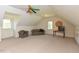 This is a bonus room with carpeting, a ceiling fan, and natural light at 2371 Nc 210, Smithfield, NC 27577