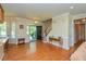 Bright foyer with hardwood floors and staircase welcomes guests into this lovely home at 2371 Nc 210, Smithfield, NC 27577