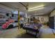 Garage with pool table, car, and workbench area at 2371 Nc 210, Smithfield, NC 27577