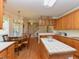 Open kitchen layout with island, breakfast nook, and staircase to the upper level at 2371 Nc 210, Smithfield, NC 27577