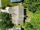 Overhead shot revealing a detailed roof, back deck, and verdant landscaping of the property at 2412 Colony Woods Dr, Apex, NC 27523