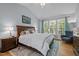 Large main bedroom with vaulted ceiling, plush carpet, and bright windows at 2412 Colony Woods Dr, Apex, NC 27523
