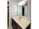 Bathroom with a vanity, large mirror, updated lighting, and neutral colored walls at 2532 Rolling Meadows Dr, Raleigh, NC 27603